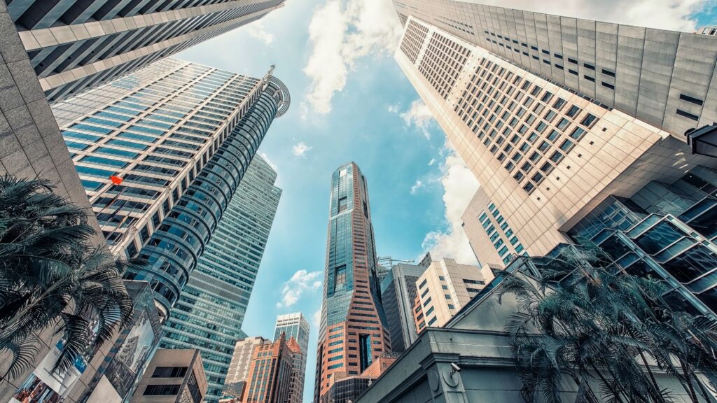 Commercial buildings in Singapore representing workplaces where WHS risk assessments are mandatory