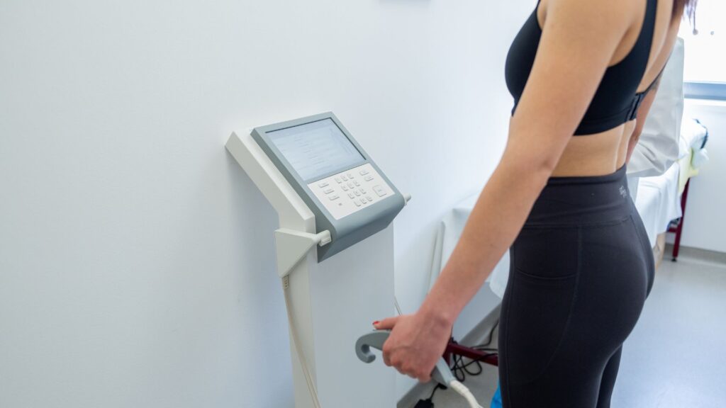 Employee undergoing body composition assessment during on-site workplace health screening in Singapore