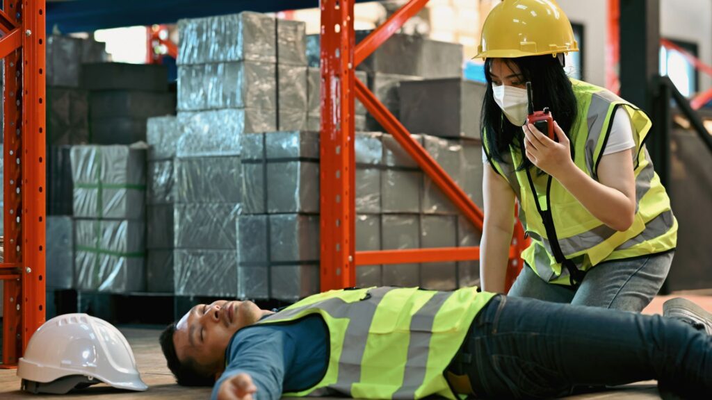worker responding to workplace accident scene reporting incident under workplace safety responsibilities singapore